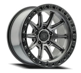 Jeep wheel rim with metallic finish on a white background