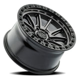 Jeep wheel rim with metallic finish on a white background