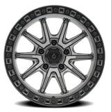 Jeep wheel rim with metallic finish on a white background