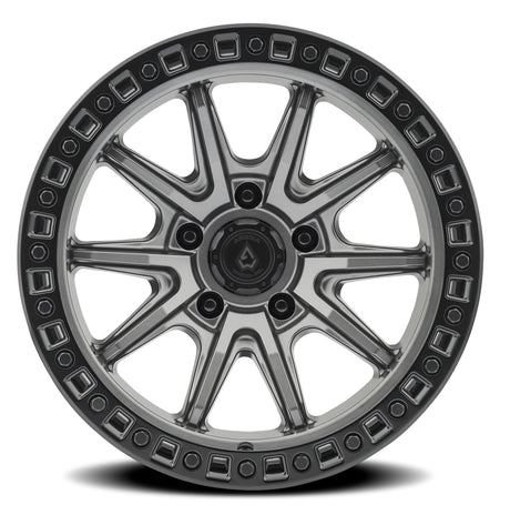 Jeep wheel rim with metallic finish on a white background