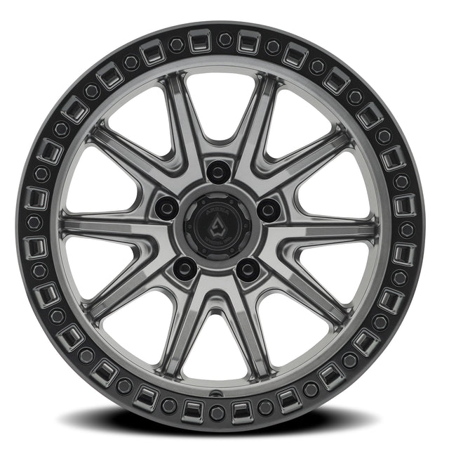 Jeep wheel rim with metallic finish on a white background
