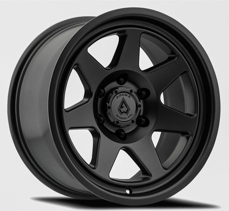 Black alloy wheel with a visible brand logo on a gray background