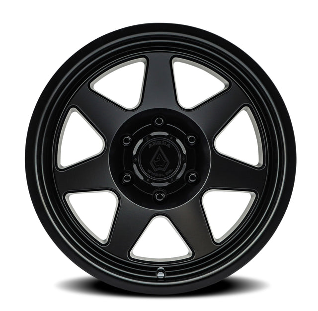 Black alloy wheel on a white background