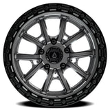 Black alloy wheel with a visible brand logo on a white background