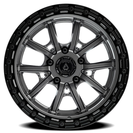 Black alloy wheel with a visible brand logo on a white background