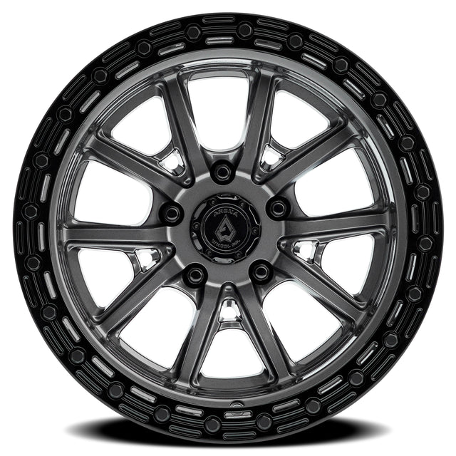 Black alloy wheel with a visible brand logo on a white background